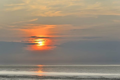 Sunset at the Wadden Sea at low tide