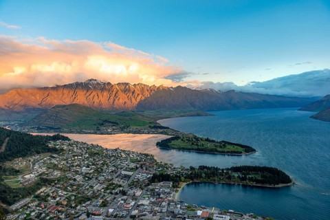 View of Lake Wakatipu and Queenstown at sunset