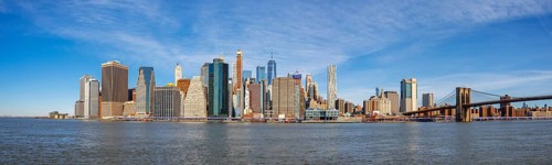View from Pier 1 over the East River to the skyline of Lower Manhattan with Brooklyn Bridge