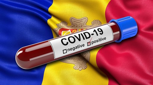 Waving flag of Andorra with a positive Covid-19 blood tube
