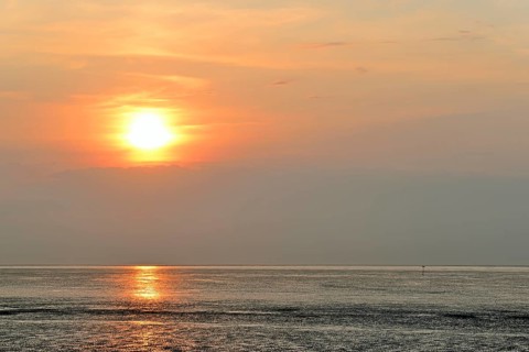 Sunset at the Wadden Sea at low tide