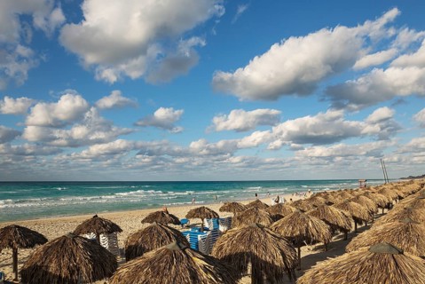 Thatched parasols at a beach in Varadero