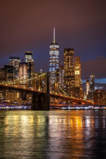 View from Main Street Park at night over the East River to the skyline of lower Manhattan