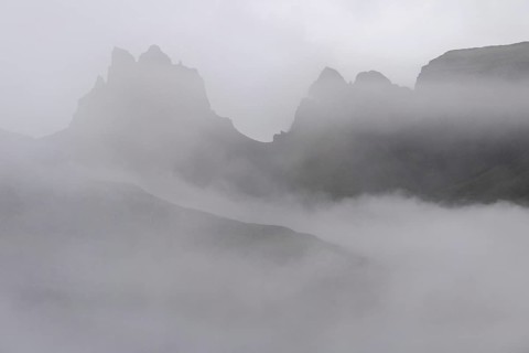 Cloud-covered rugged mountain peaks