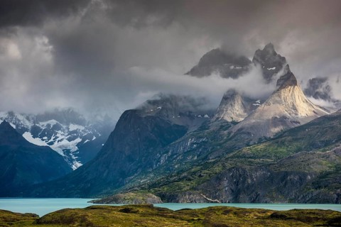 View over Lake Nordenskjoeld to the mountain range Cuernos del Paine in clouds