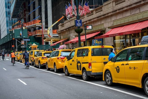 Typical yellow Taxis lined up in front of the Grand Central Station