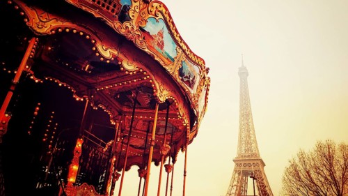 Old carousel in the park near Eiffel Tower