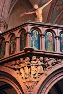 Stone relief of the Damned on the rood screen