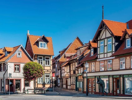 Alley with small half-timbered houses and cobblestones