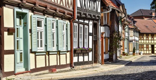 Alley with half-timbered houses and cobblestones