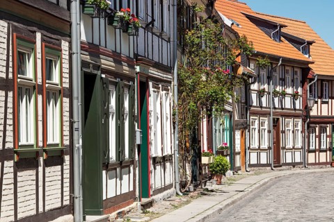 Alley with half-timbered houses and cobblestones