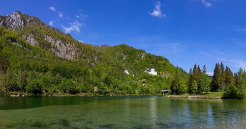 Castle Klaus with mountain church at the Klaus reservoir