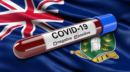 Flag of British Virgin Islands waving in the wind with a positive Covid-19 blood tube