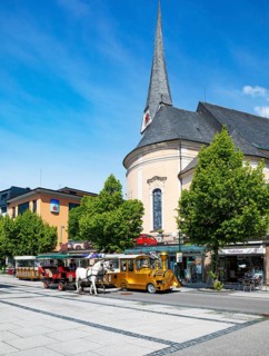 Fiaker and slow train in the pedestrian zone