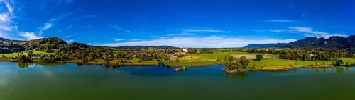 Aerial view of Schlehdorf Monastery with St. Tertulin Parish Church at Lake Lake Kochel
