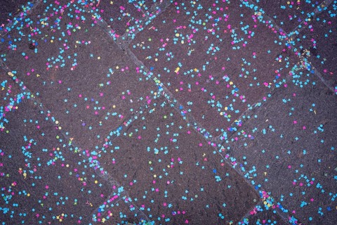 Colourful confetti after a carnival procession in the street