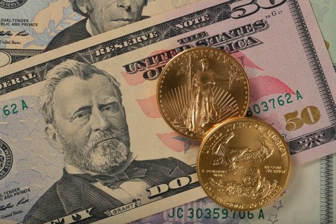 Physical gold coin 1 oz American Gold Eagle obverse and reverse Lady Liberty on 50 US dollar banknote