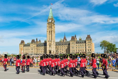 Changing of the guard in front of the Canadian Parliament Building Centre Block