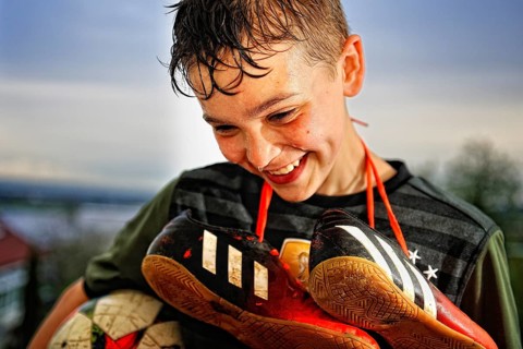 Boy with soccer shoes