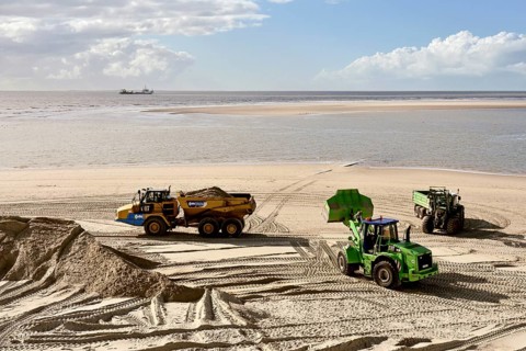 Arbeiten am Strand
