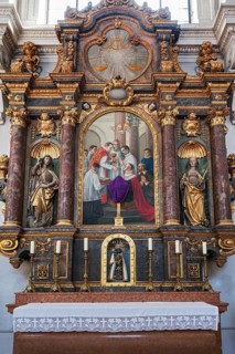 Side altar with figures of saints and black Madonna