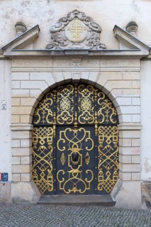 Old decorated wrought-iron gate at the meat market