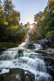 Hiker at McLean Waterfall