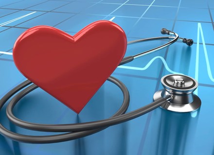 Heart and stethoscope on ECG