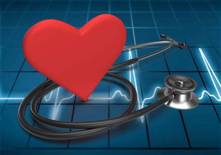Heart and stethoscope on ECG