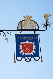 Craftsman's sign Amt der Maurer Anno 1862 on a building in the old town