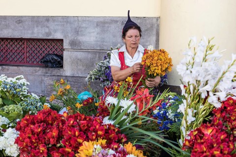 Flower seller in traditional clothing