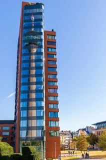 Portobello with reflection of the Rhine Tower in the glass facade