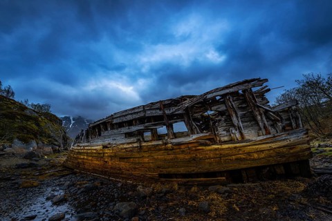 Derelict shipwreck on shore