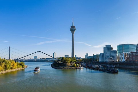 City panorama at the Media Harbour with Gehry buildings at the new Zollhof and Rhine Tower