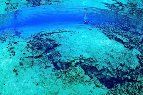 Divers in the Silfra Lagoon