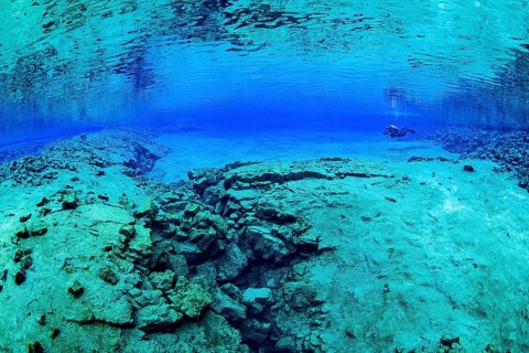 Divers in the Silfra Lagoon