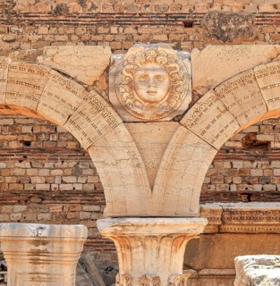 Columned arch with a Medusa head