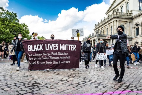 Banner with names of victims of racist violence