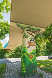 Graffiti under bridge with monkey and banana