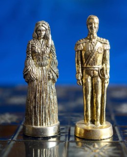Chess pieces on a play board