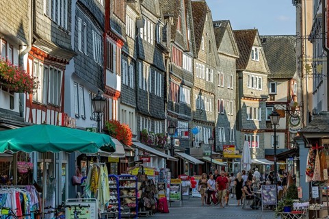 Shopping street with historic half-timbered houses