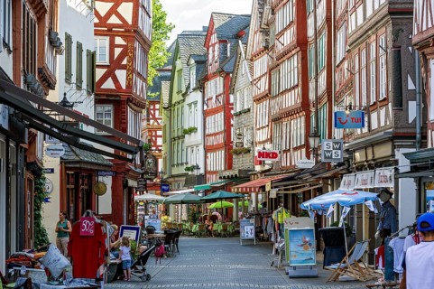 Shopping street with historic half-timbered houses