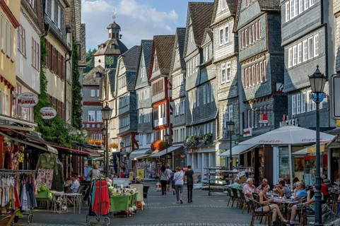 Shopping street with historic half-timbered houses