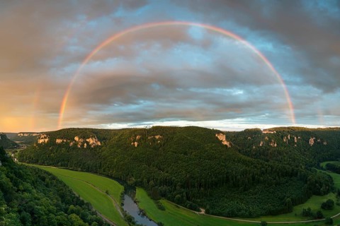 Rainbow at sunset over the upper Danube valley