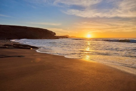 Beach Playa de la Pared at sunset