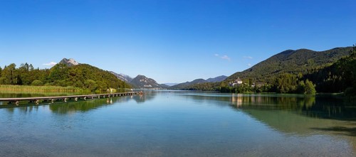 Bathing beach at the Fuschlsee with Fuschl Castle
