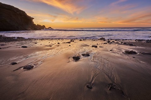 Beach Playa de la Pared at sunset