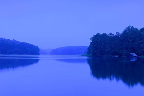 Blue hour at the lake Schmaler Luzin with boathouse