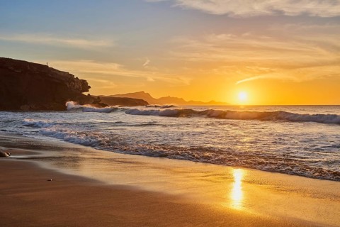Beach Playa de la Pared at sunset