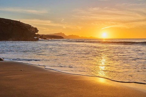 Beach Playa de la Pared at sunset